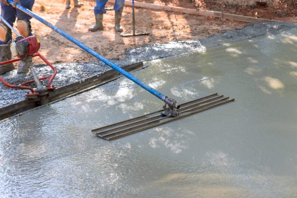 In,Addition,To,Leveling,Concrete,For,Driveways,,Workers,Use,Trowel